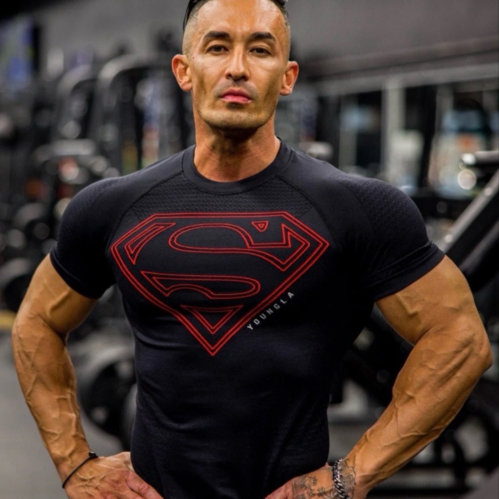 YOUNGLA SUPERMÁN BLACK AND RED COMPRESSION SHIRT